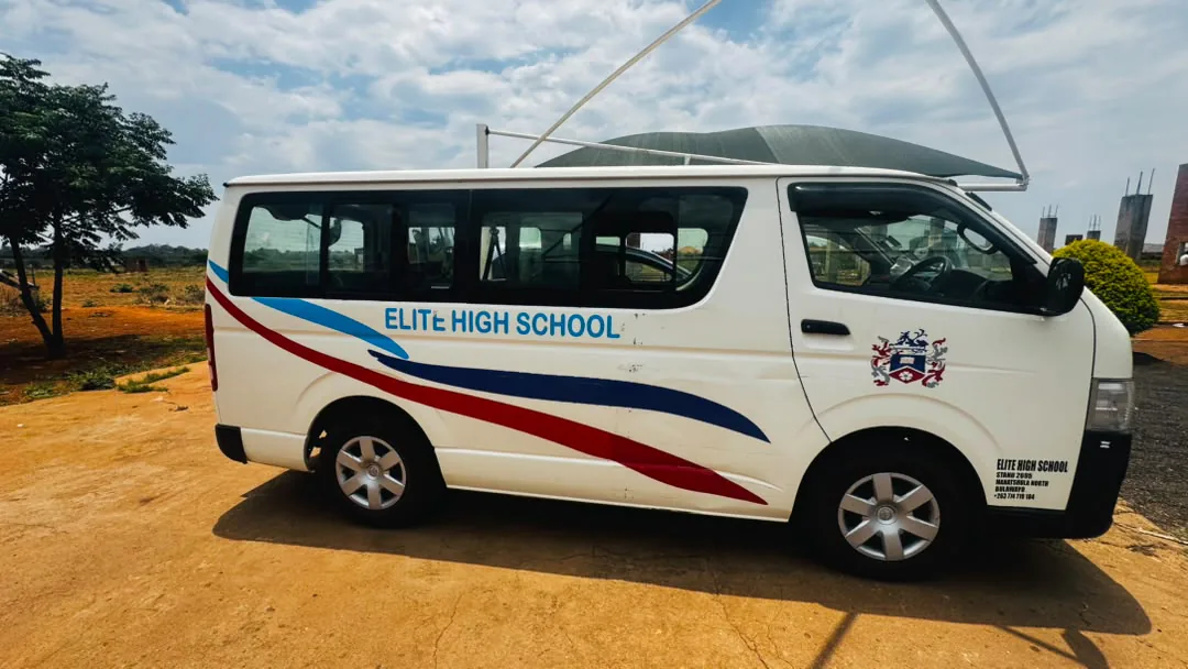 The Elite High School van with the school crest